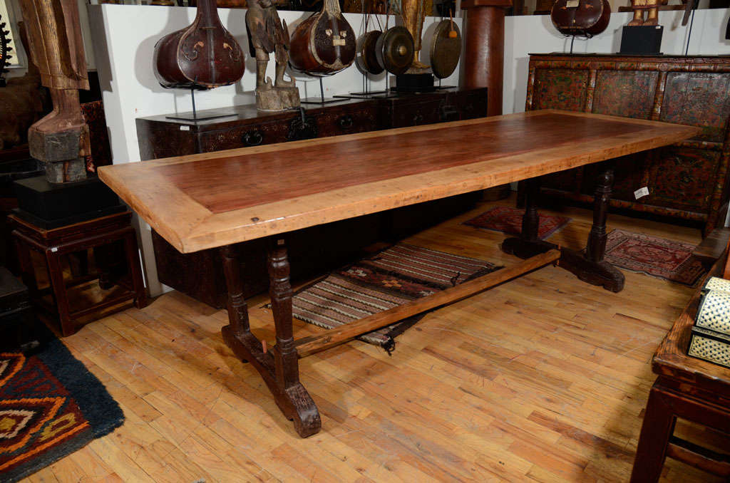 Dining Table with Ironwood frame, mahogany inset and rosewood legs.