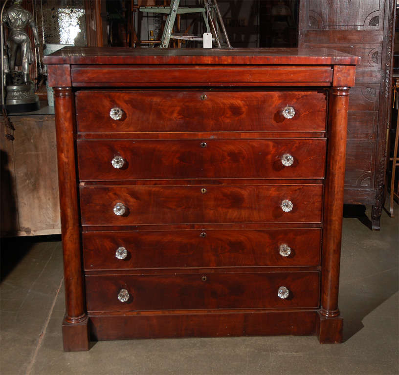 The dresser is either English or Scottish, 19th century, larger than most chest, has five drawers having glass knobs along with another less obvious drawer at the top. Jefferson West antiques offer a selection of antique furniture, mirrors,
