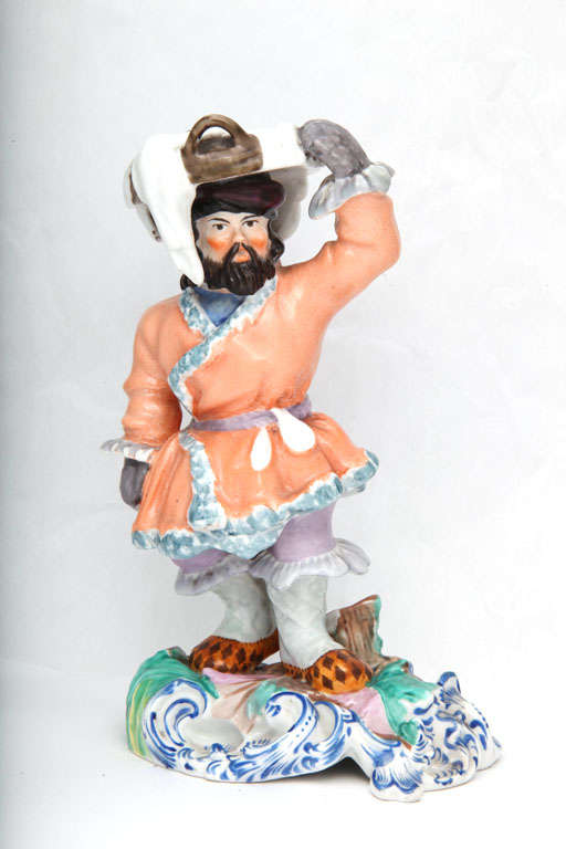 A Fine Unmarked Gardner Porcelain Figure Of A Peddler
