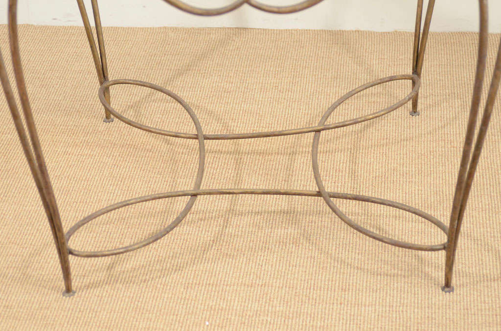 French A Wrought Iron Art Deco Occasional Table by Rene Drouet.