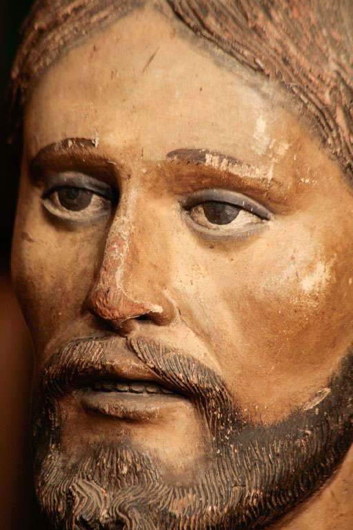 Wood Carved wood and painted head of Saint.