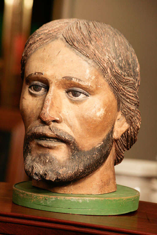 Carved wood and painted head of Saint. 1