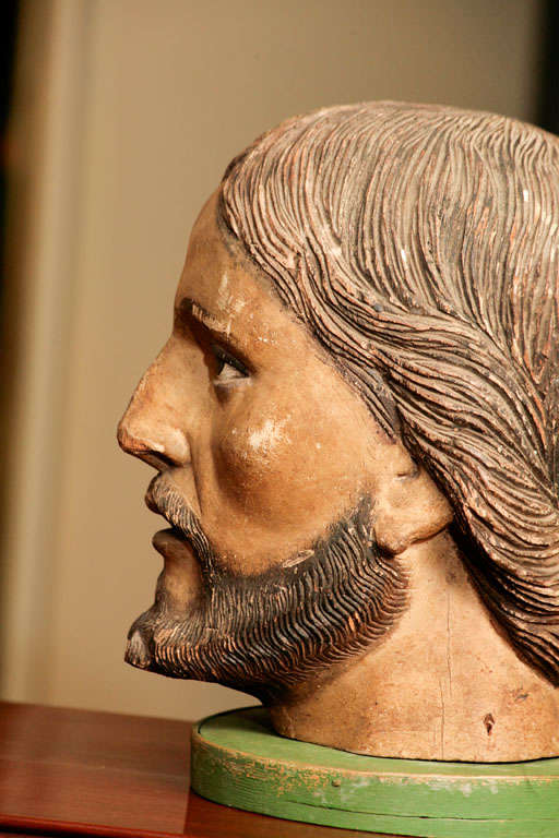 Carved wood and painted head of Saint. 2