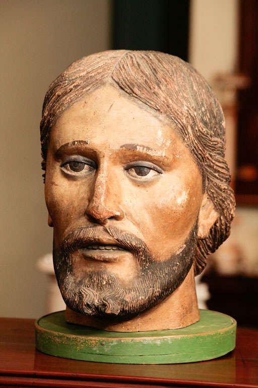 Carved wood and painted head of Saint. 5