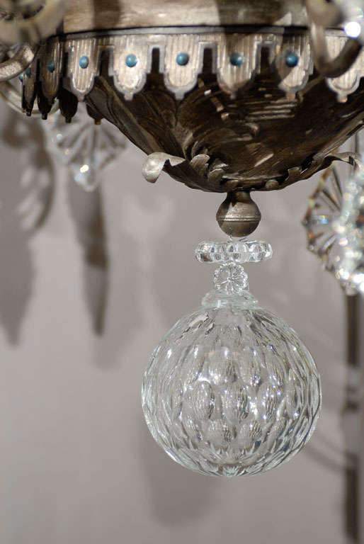 Bronze Lustre ancien. Lustre en fer et cristal peint en vente