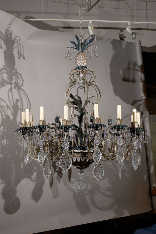 Magnificent painted iron and bronze chandelier with crystal pendalogues