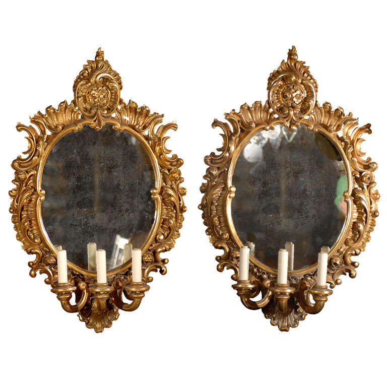 Pair of mirrored sconces