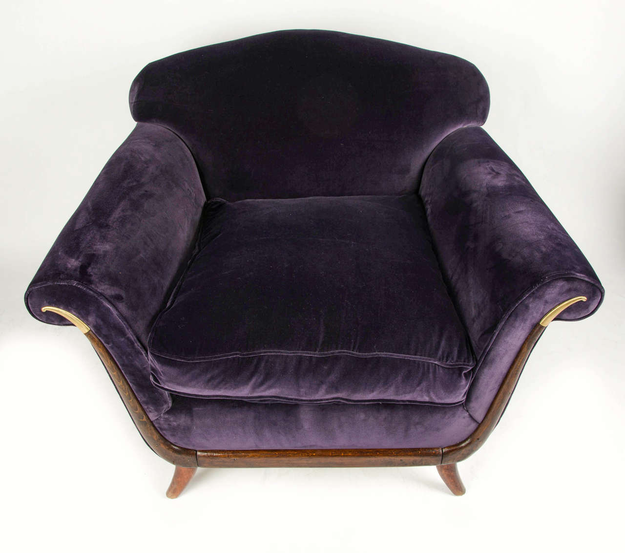 A pair of Neo-Regency armchairs with decorative wooden frame and brass endings, in the style of G.Ulrich c.1940's