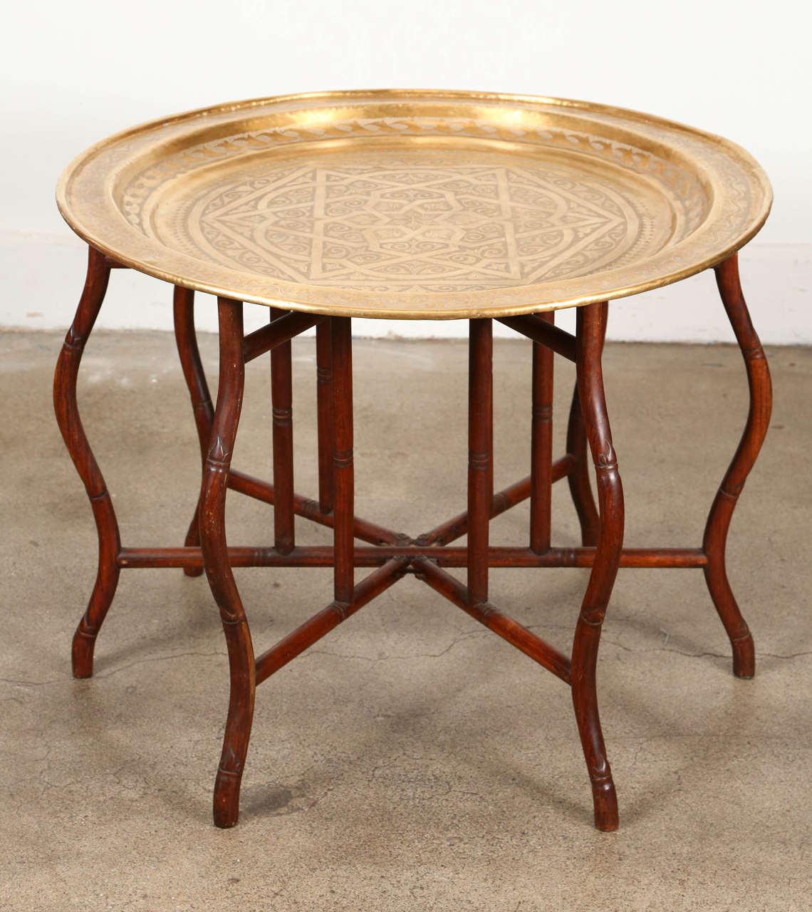 Very hard to find large Persian polished gold brass tray table on bamboo folding base, could be use as a coffee table or low dining table, this is how they use them in Morocco, Syria, India, Egypt and in the Middle East to serve food or tea. Great