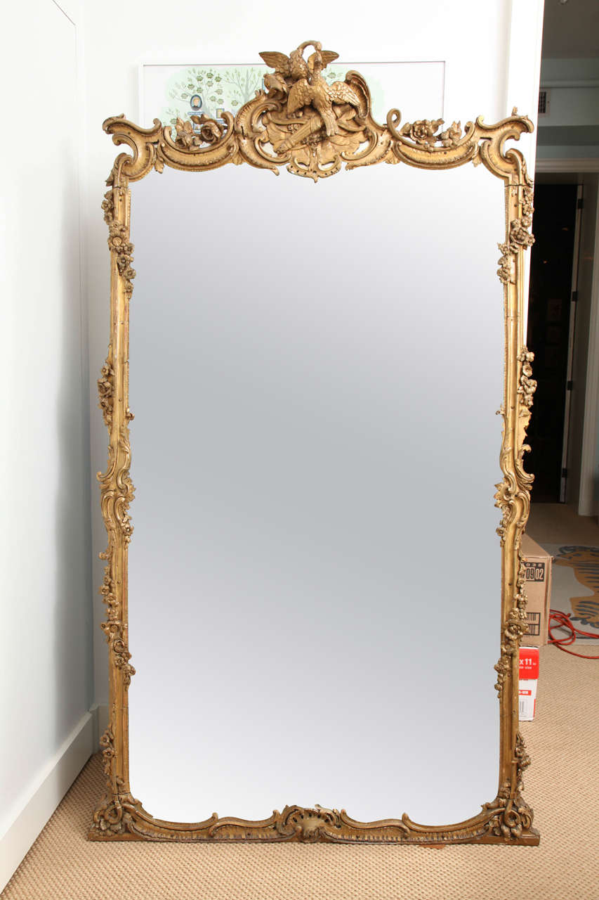 A Large Louis XV Style Carved and Gilded Mirror, France 19th Century
