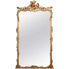 A Large Louis XV Style Carved and Gilded Mirror, France 19th Century