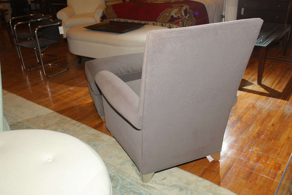 Pale Grey Upholstered Chair & Ottoman 1