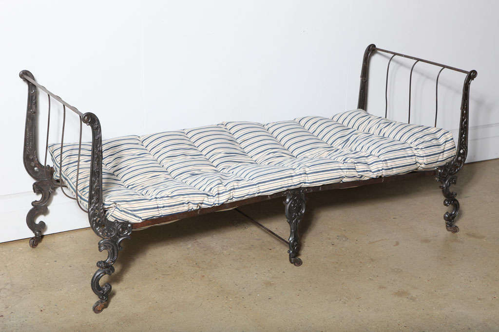 restored cast iron 19th century folding Daybed (featherbed featured in photograph, available at additional cost)
