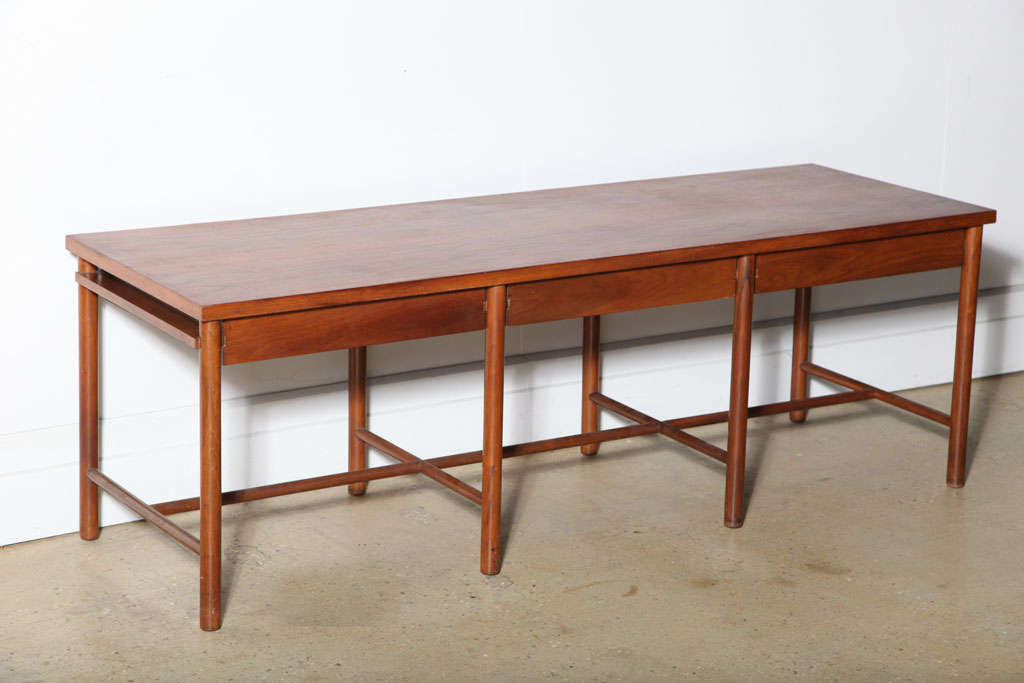 3 drawer Danish Console Table.  Provides good storage.  Excellent for large screen HDTV, children's desk or console server