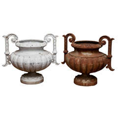 Pair of Napoleon III Cast Iron Urns