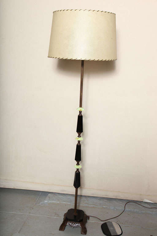 Black and jade color akro agate, cast antique brass base, antique brass pole, handstitched fiberglass shade, 3-way 150 watts or compact florescent.  Shade is 16 x 18 x 11.