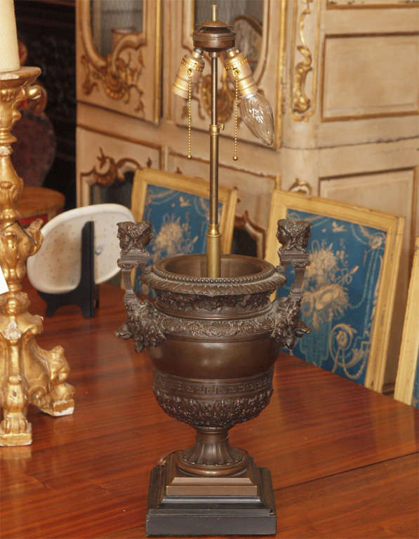 Early 19th century cast bronze urn now wired as lamp and silk shade