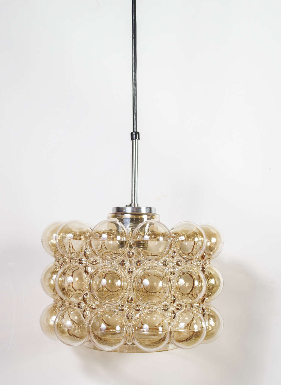 German Amber Bubble Glass Pendant Light circa 1960s.
Newly rewired on short stem, then black plastic cord to canopy.