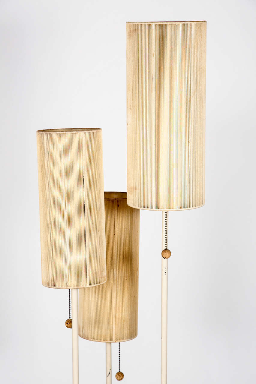 Three stem floor lamp in painted steel with original cord shades