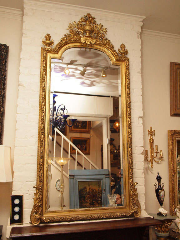 Antique French Napoleon III carved and gilded mirror.