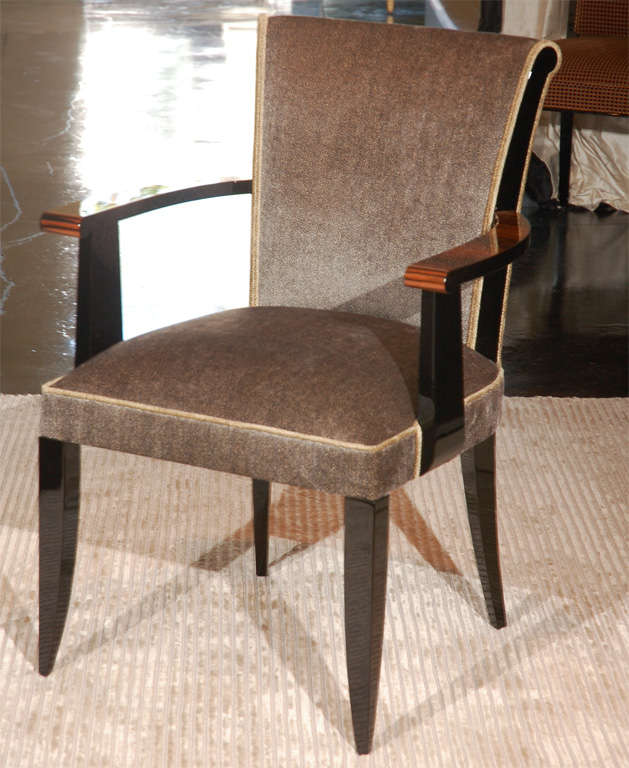 Macassar arms with black lacquer legs and details. Available as Custom-made in any veneer and size.
