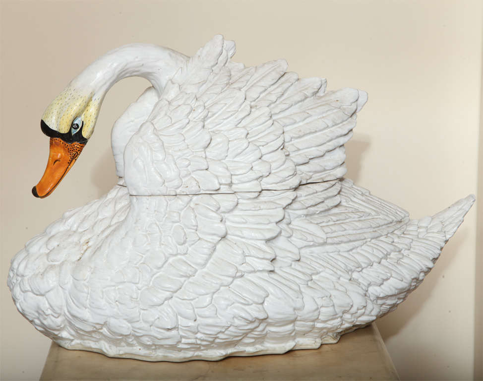 A naturalistic Italian ceramic life sized swan vase with lid.