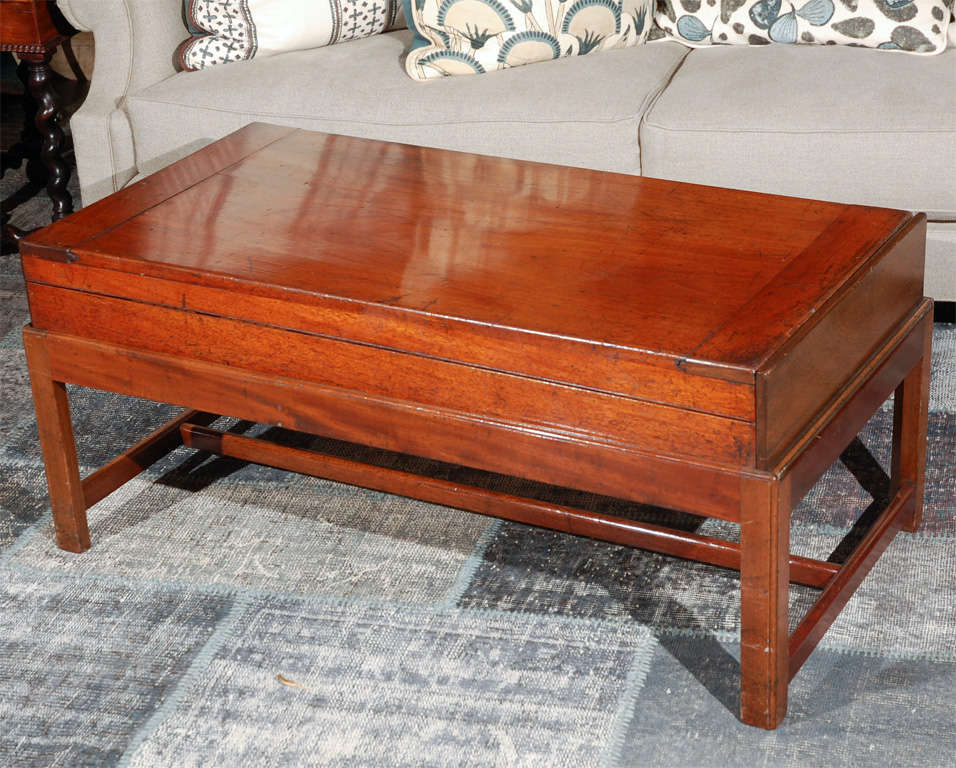 Rectangular coffee table in mahogany on fitted straight leg base. Opens to a bagatelle game table.