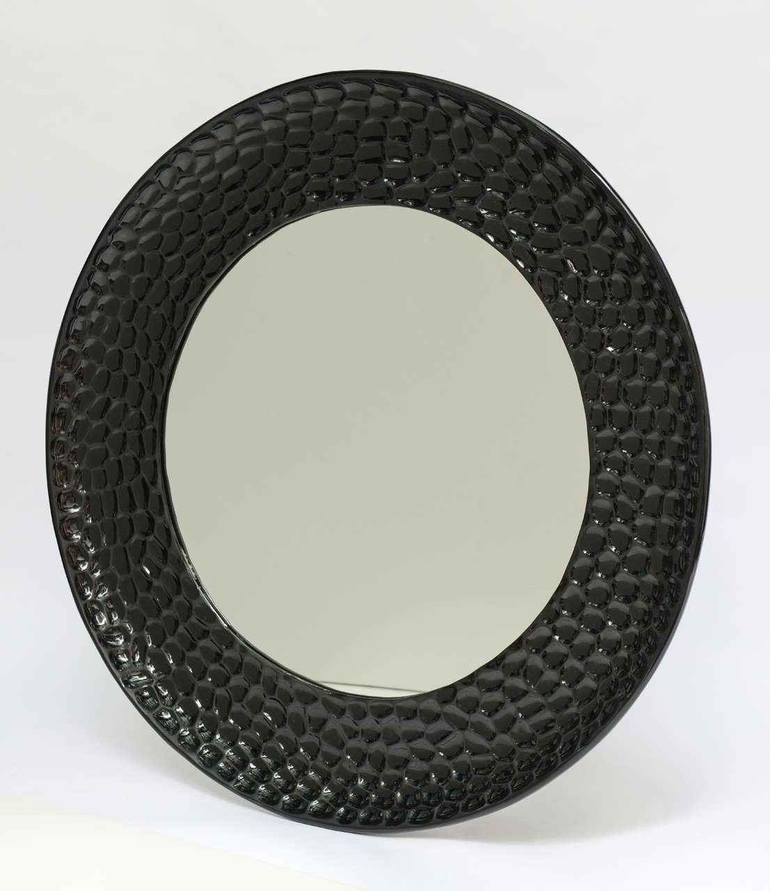 Beautiful design of that beveled mirror looks giving the feeling of a bees house. The mirror has been lacquered in black high gloss polyurethane paint by our own furniture restoration and finish by hand. This piece will give on any room a beautiful