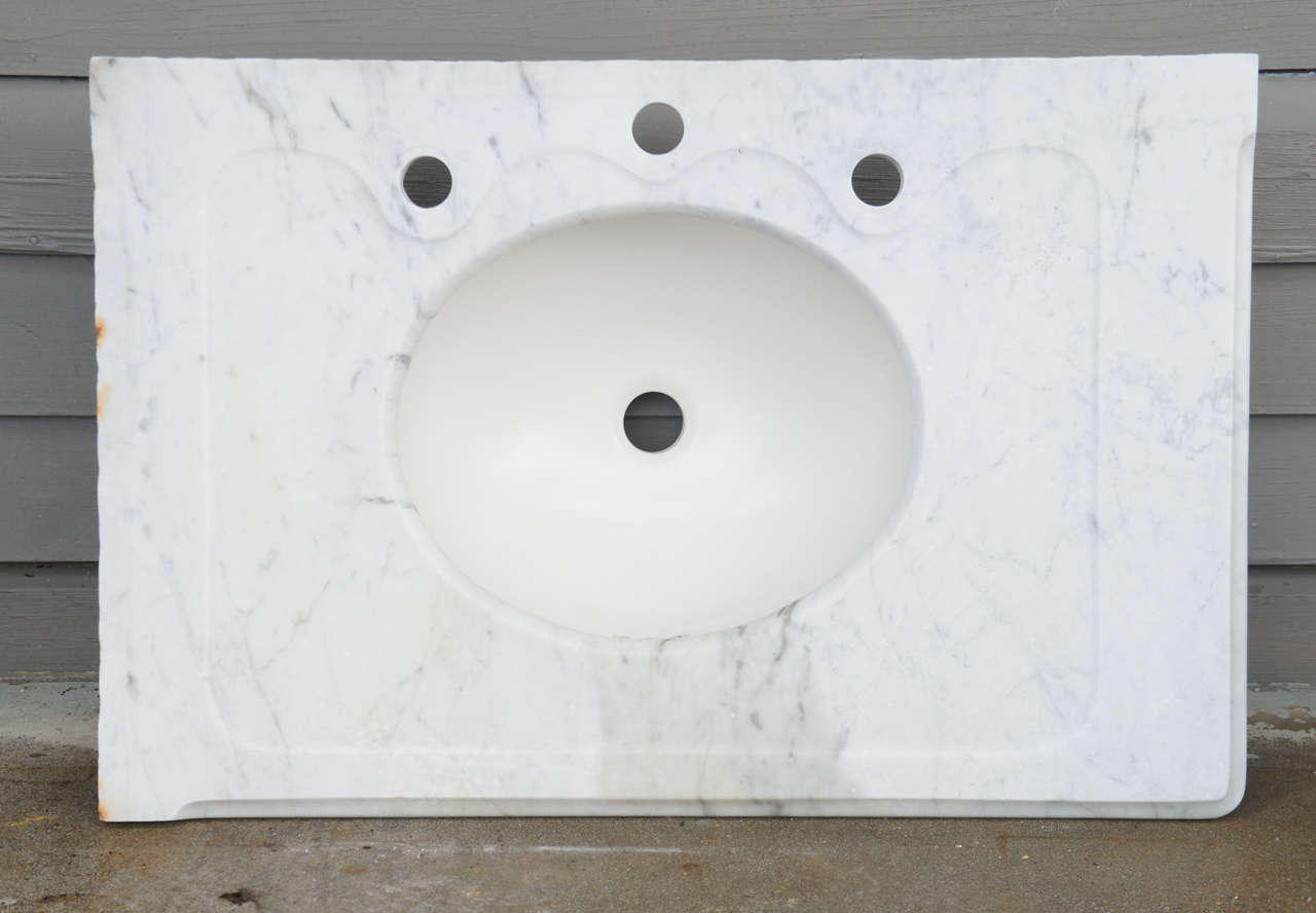 Vintage marble vanity sink top with newly drilled holes to accommodate modern fixtures.   New sink mounted below.  See matching top in additional listing.