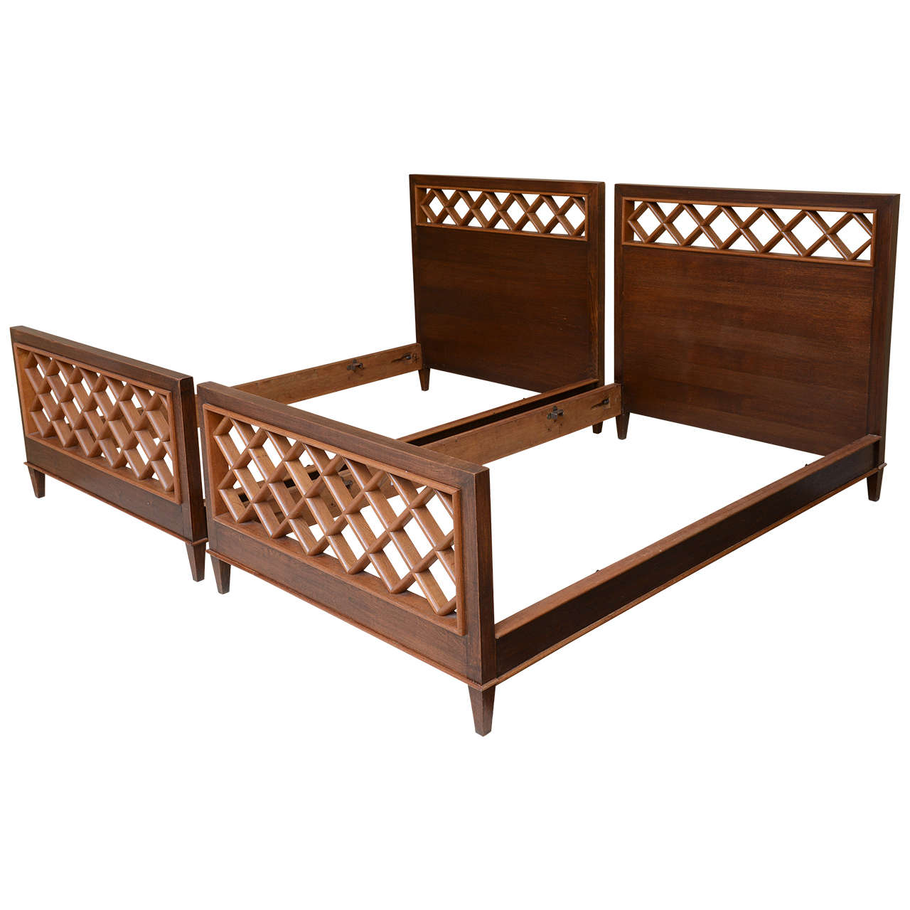 Pair of French, Modern Mahogany and Fruitwood Beds of Jacques Adnet