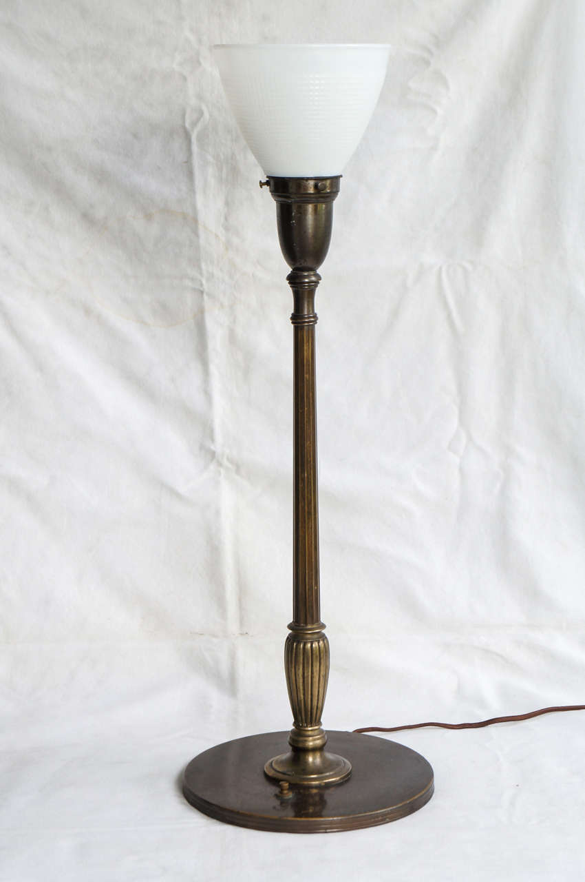 Edwardian banquet lamp.  Brass with perfect original patina. Original glass shade. Switch on the base.