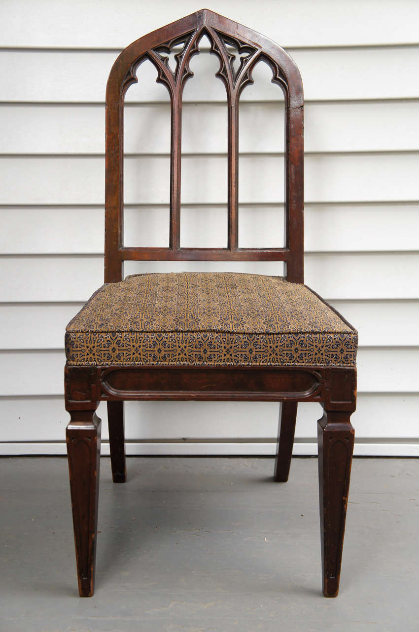 1830s  mahogany chair hand carved in the tracery pattern of three Gothic arches. Very rare, early example of this fine carving.