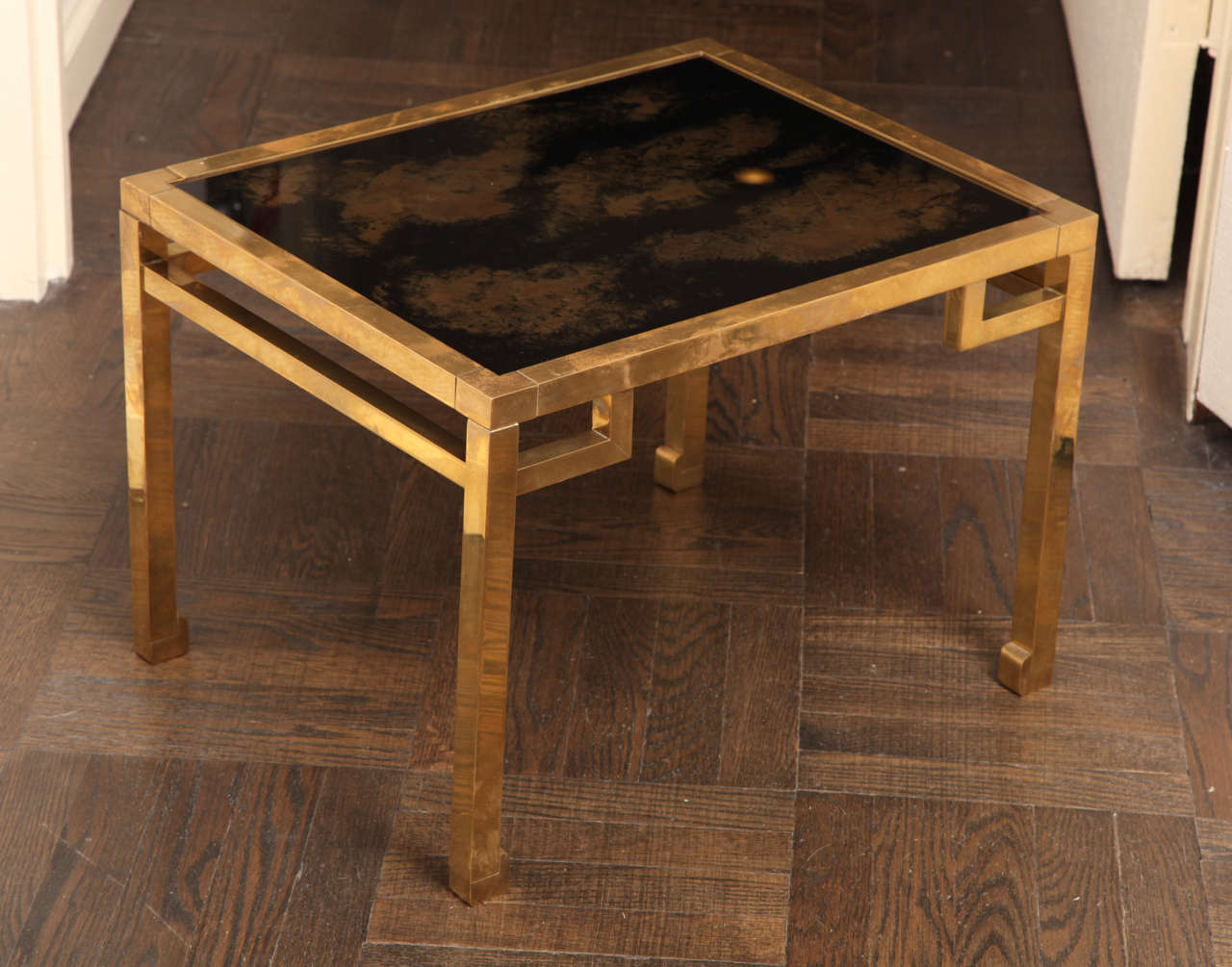 A Small Geometric Side Table with Fitted Antique Black & Gold Glass Top