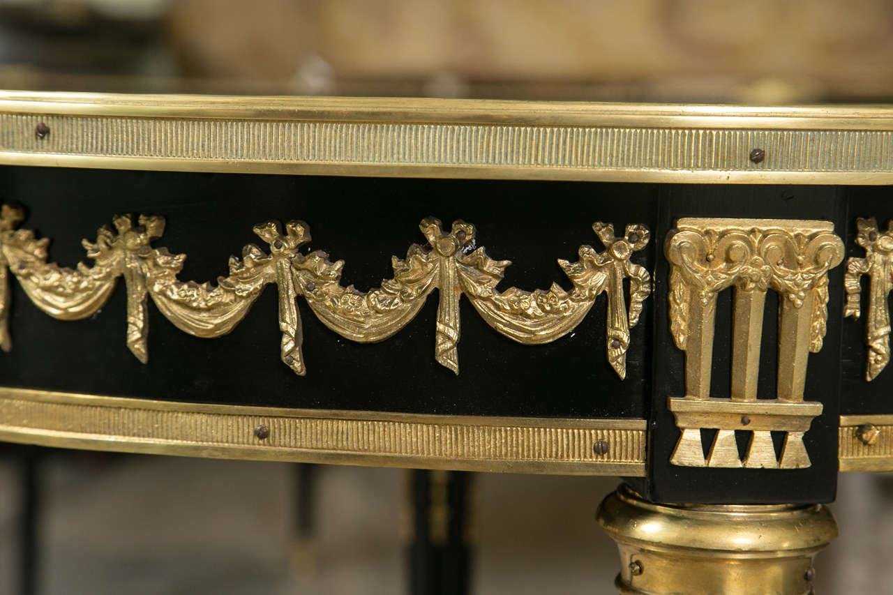 Mid-20th Century Ebonized and Bronze Mounted Centre Table in Louis XVI Style by Jansen