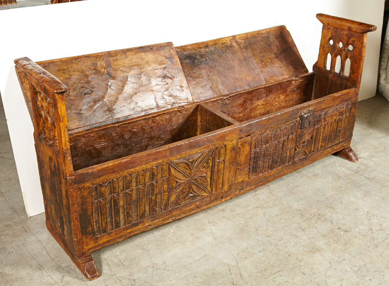 This fabulous and very rare 15th Century French Period Gothic Archebanc made from Almond and Oak is a true piece of history. The term Archebanc is basically used to describe a bench with no back and side arms on a trunk.  These pieces were used up
