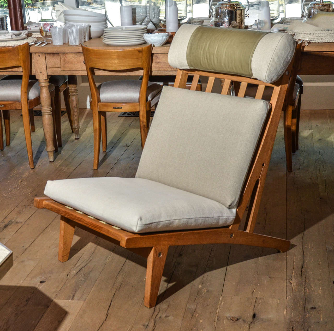 Stunning Mid-Century Danish deck chairs by Hans Wegner, newly re-upholstered in linen cotton blend in Ecru and Flax with olive leather detail.