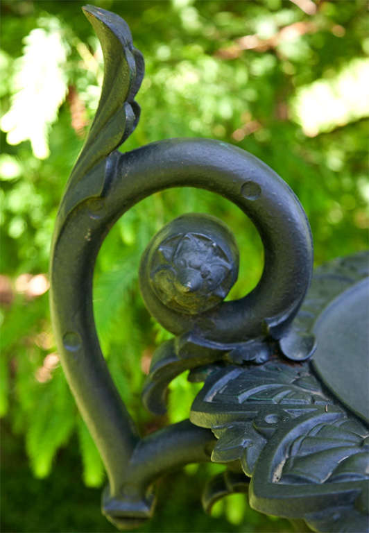 A cast-iron urn in the Shield and Leaf pattern on crane pedestal, manufactured by J. W. Fiske Iron Works, New York, marked 