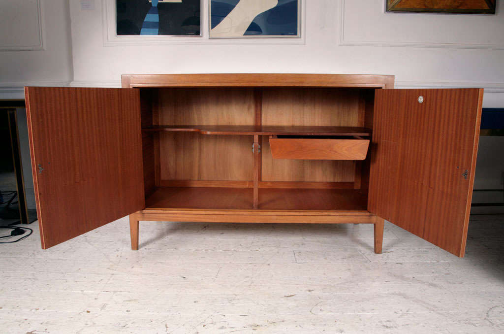 In 1953 DNA double helix was discovered and Gordon Russell commissioned Judith Ledeboer and David Booth to design this fantastic sideboard - credenza