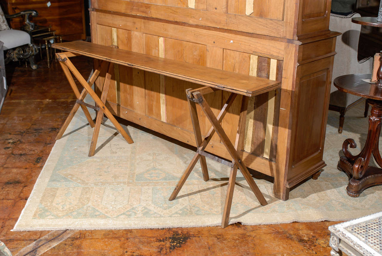 Unusual folding campaign console table. 1