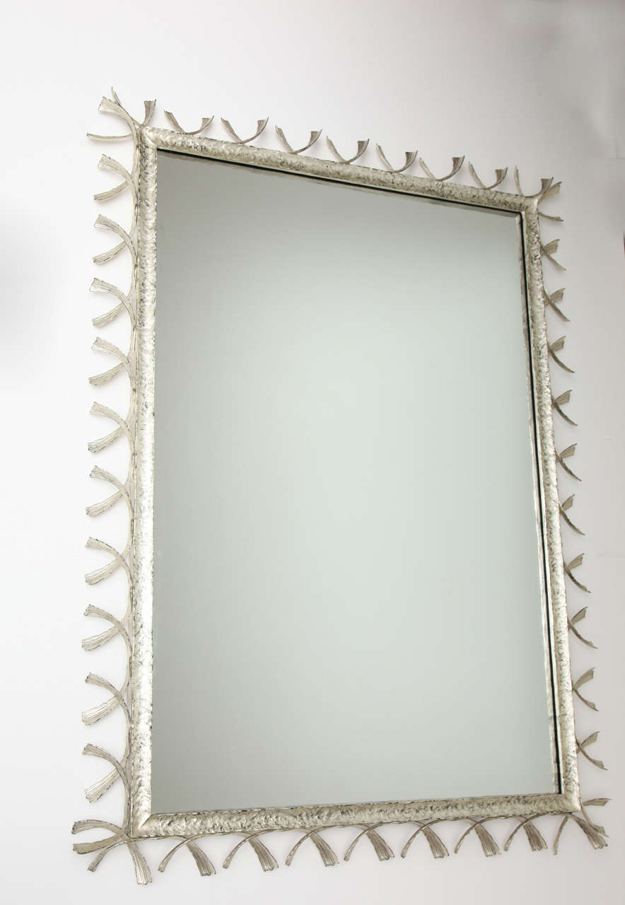 A unique contemporary mirror by William P. Sullivan in white gilt bronze.