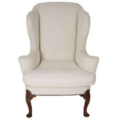 A George I Walnut Wing Chair.