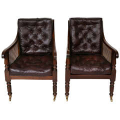 A Near Identical Pair Of Regency Bergere Chairs.
