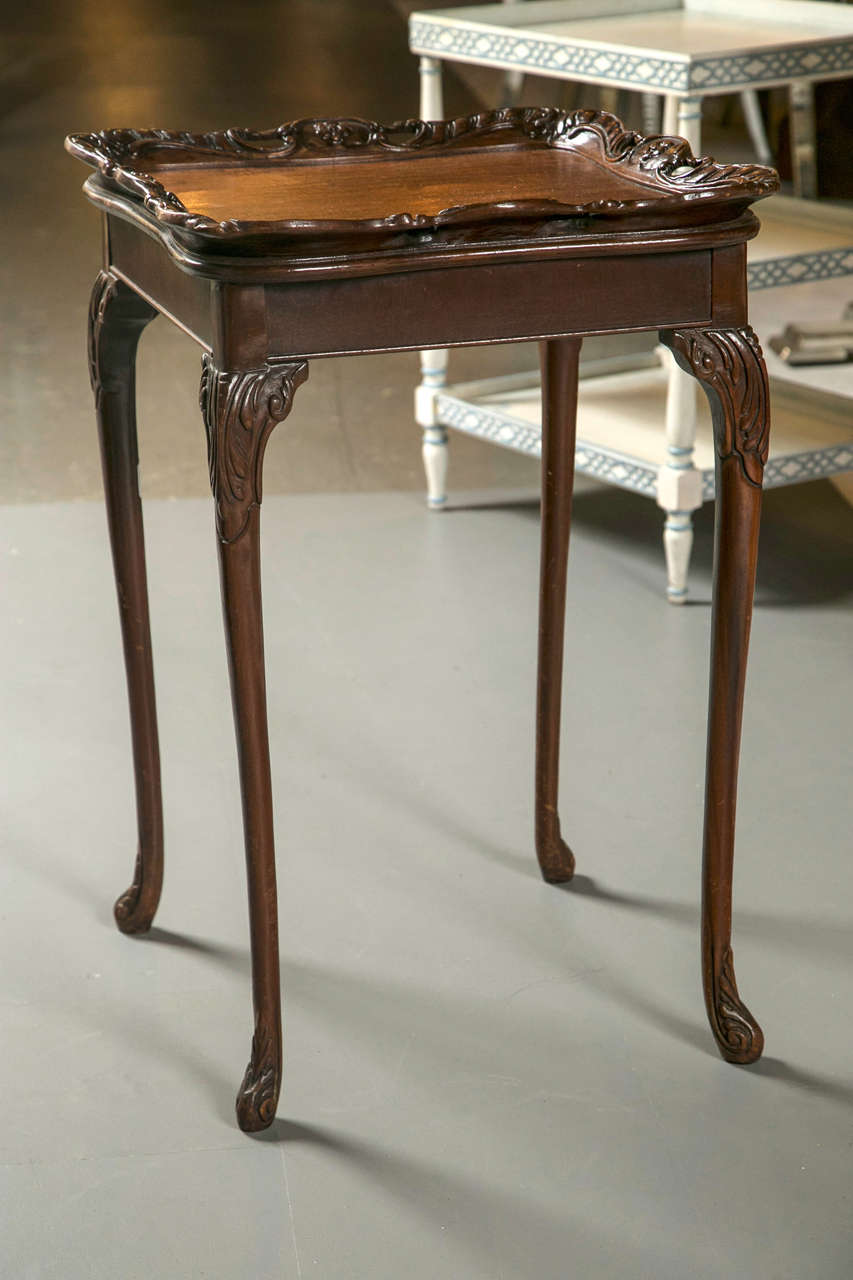 Carved, tray top side tables.