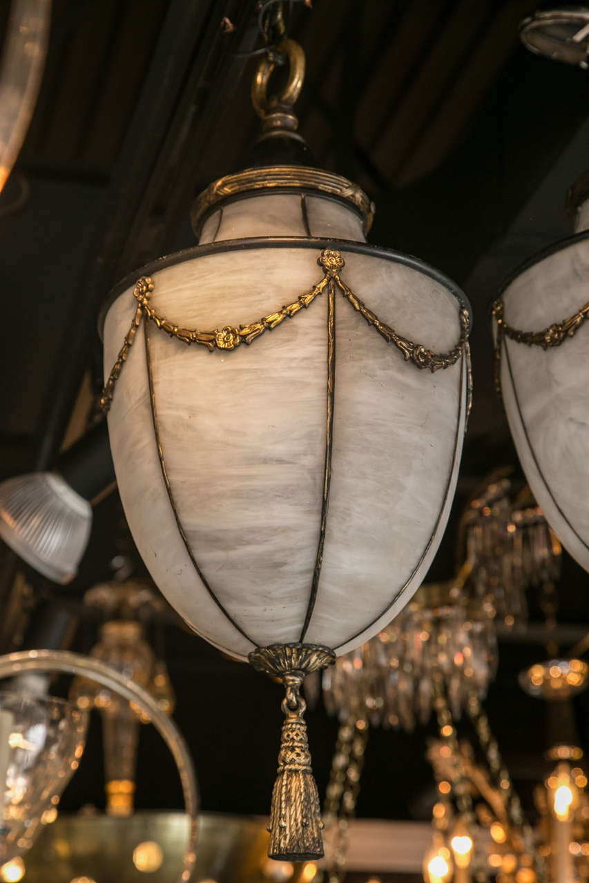 A beautiful pair of Caldwell leaded glass lanterns, circa 1900.
