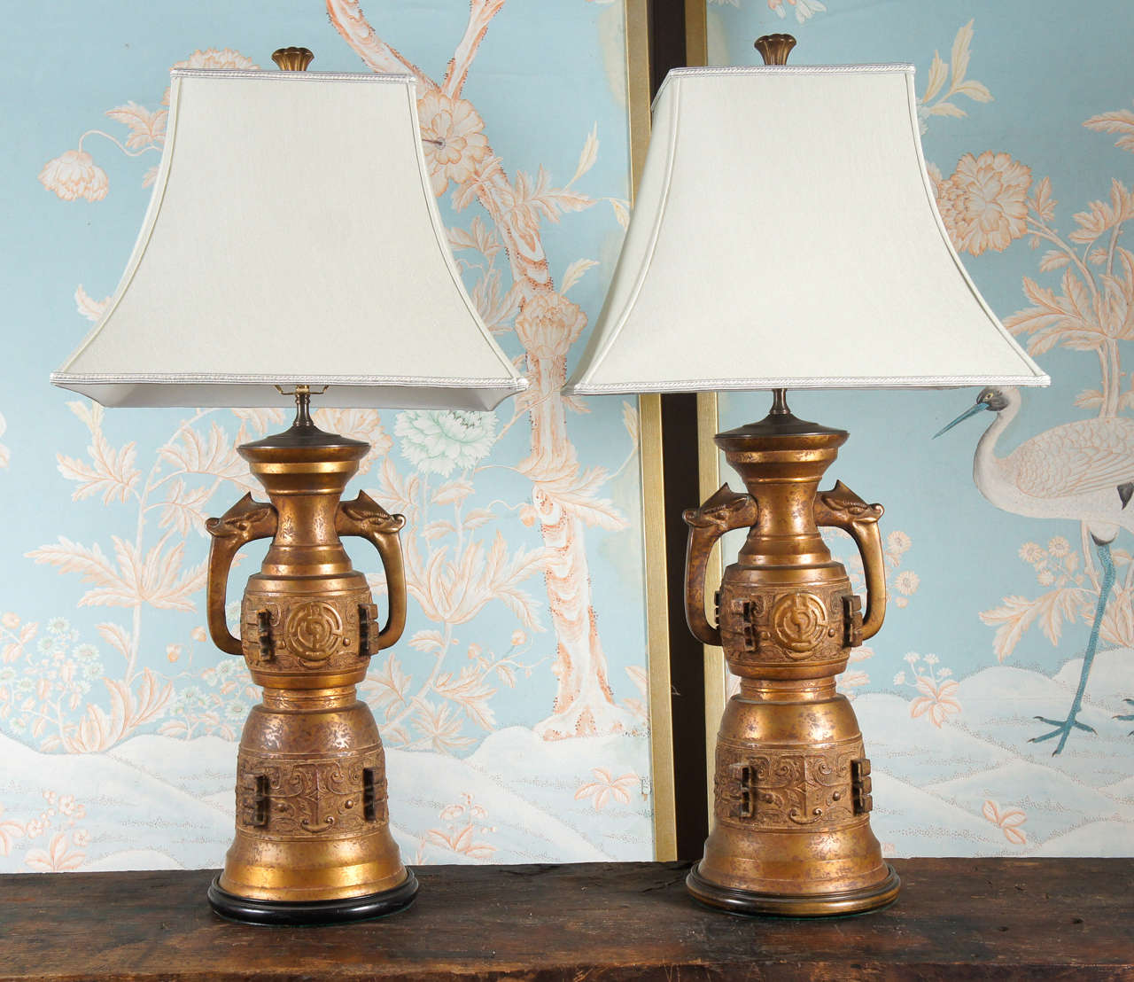 pair of decorative oriental style table lamps - reticulated surface with animal head handles - log gold patinated surface - rewired - new shades