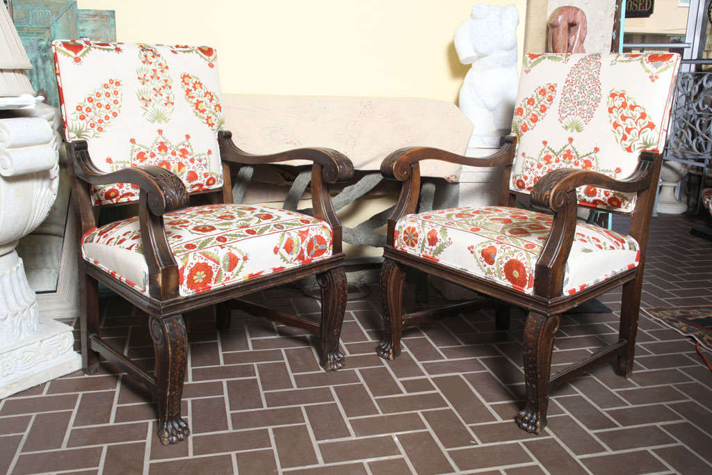 19th century carved Italian walnut chairs, upholstered with beautiful vintage suzani textile.