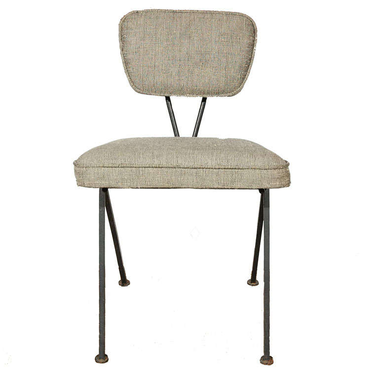 Upholstered side chair with iron base by Luther Conover