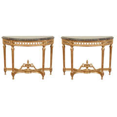 Pair of Louis XVI style gilded consoles Pair of Louis XVI style gilded consoles
