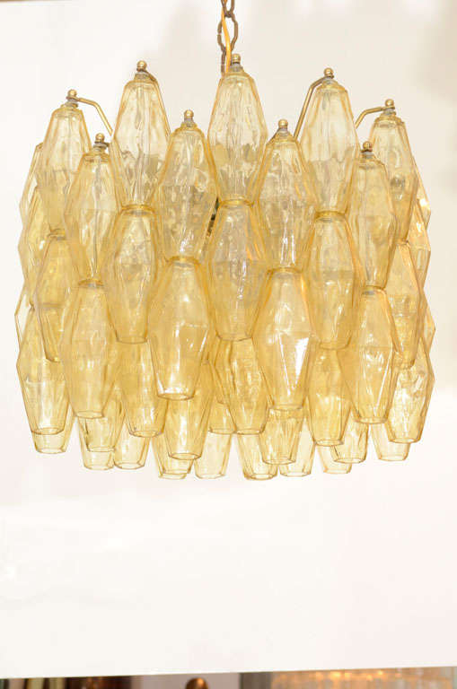 Exceptional polyhedral amber murano glass chandelier designed by Carlo Scarpa for Venini.