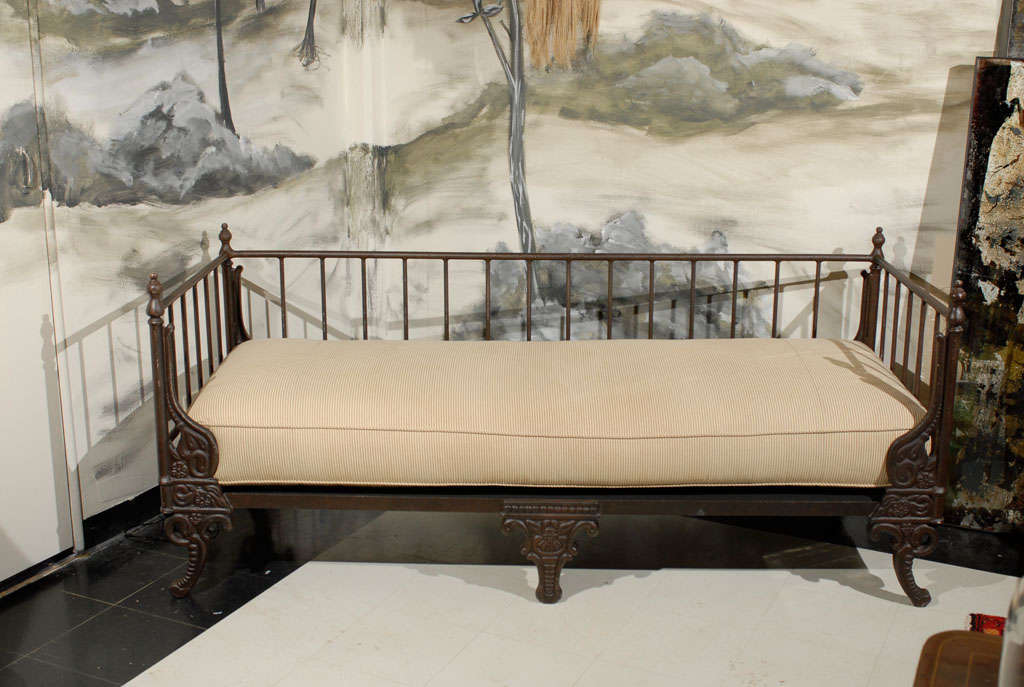 19th Century French Iron Daybed with a gray and cream stripe custom cushion.